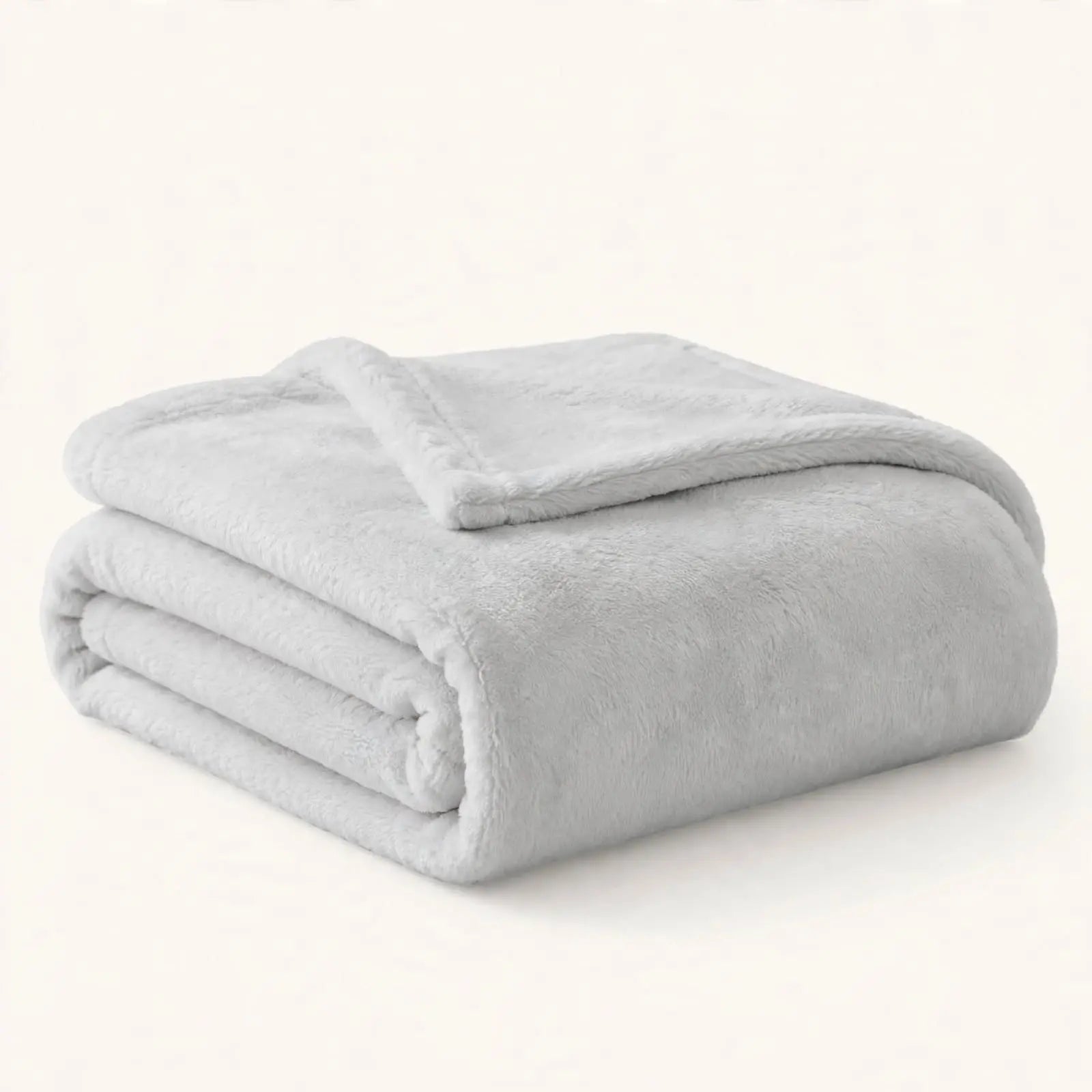 Manta LUDD gris claro de forro polar SOLHUSEN 130x160cm